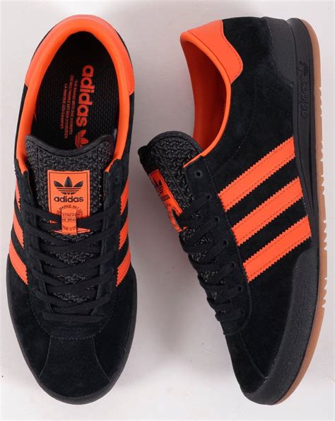 orange adidas schuhe|adidas black and orange shoes.